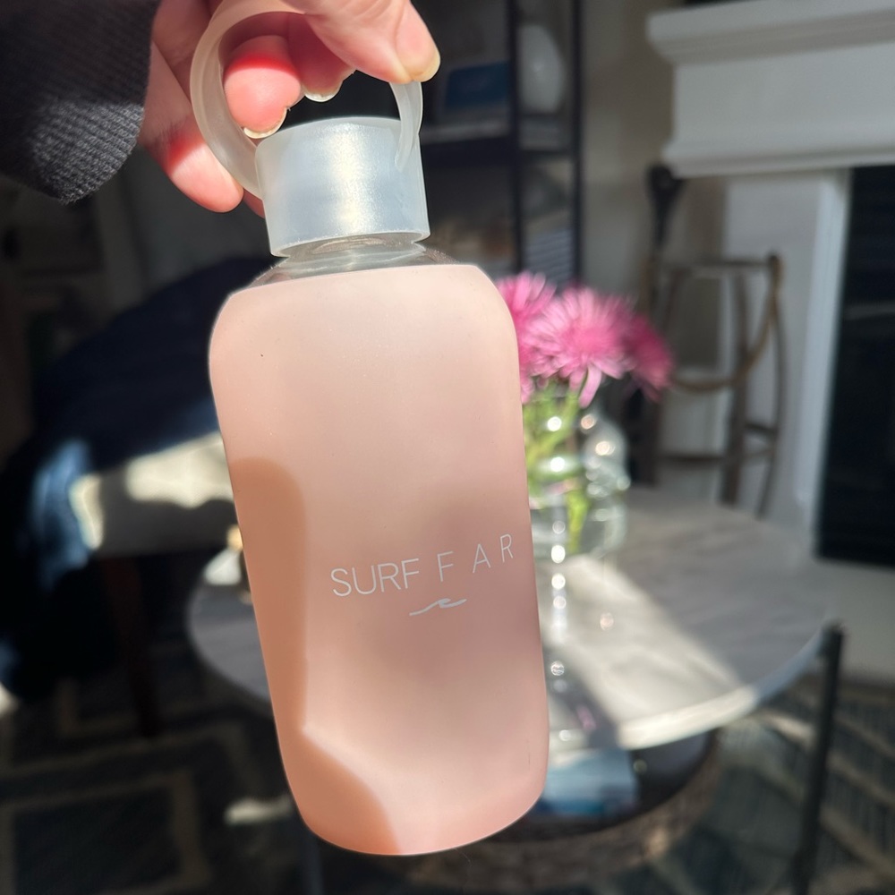 Surfar branded glass water bottle